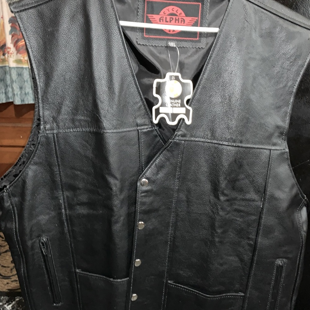 Men’s motorcycle vest, plus size with lace up sides.
